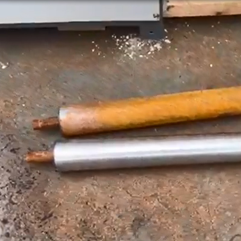Idler roller shaft polishing machine